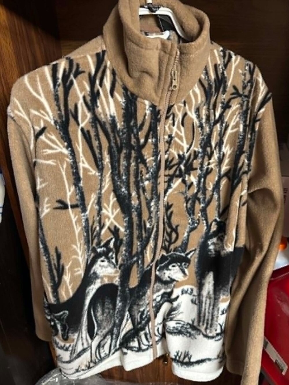 Fleece Fluid brand full-zip jacket with a wolf and forest print